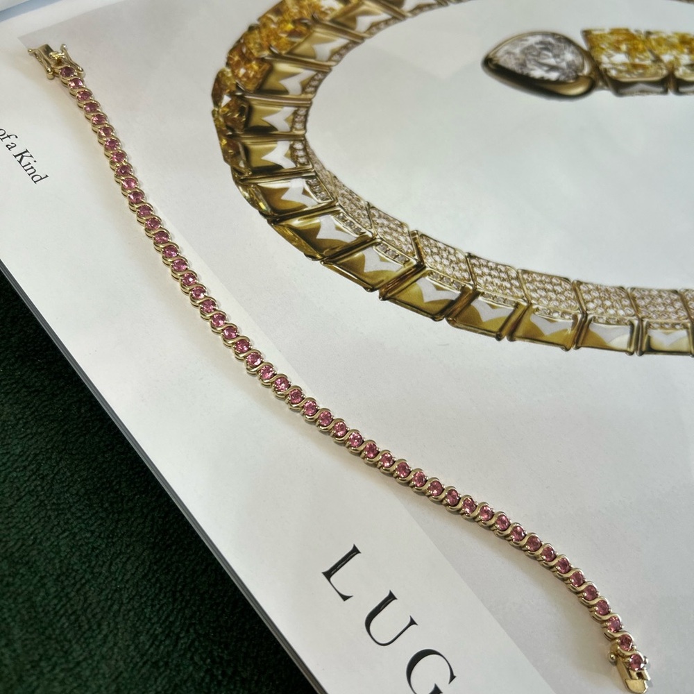 10k Gold 12.9 grams. Pink Synthetic stones.